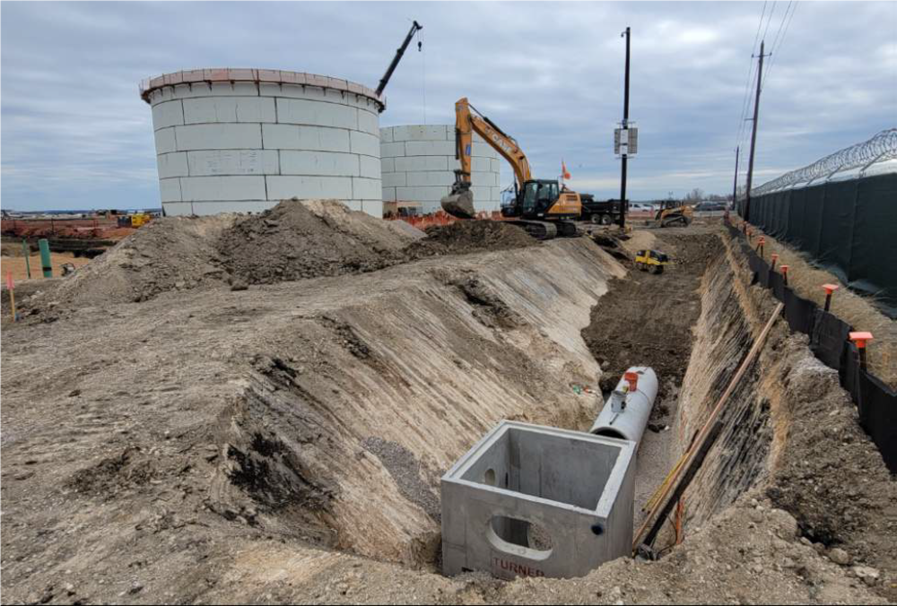 Trench with wastewater pipe laying in it. 