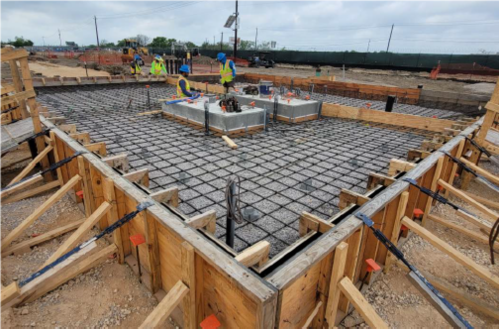 Wood frame in place around future pump pad area to prep for concrete.